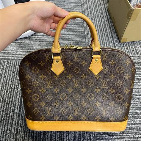 louis vuitton alma fake|false louis vuitton alma bags.